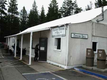 The store, post office, and the Grill in their seasonal tent cabin